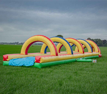 Springkussen 18 meter waterglijbaan